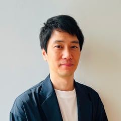 2002年入社、男性SE社員の写真